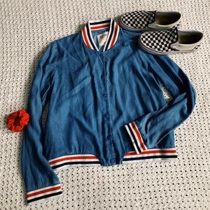 red, white, and navy blue jacket